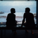 silhouette of man and woman talking