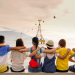 group of friends with arms around each other