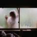 Woman on outside of window
